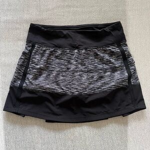 Lululemon Pleated Tennis Pace Rival Skirt (color- Heathered Black)